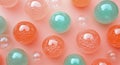 Colorful bubbles forming a gradient pattern on a pastel pink background Royalty Free Stock Photo