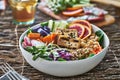 Colorful buddha bowl with grilled tofu and pea shoots