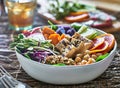 Colorful buddha bowl with grilled tofu and pea shoots