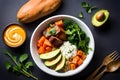 A colorful Buddha bowl with quinoa, roasted sweet potatoes, avocado, and a tahini dressing. Ai generative