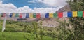 Colorful Buddhist flags all over the place at Ladakh region of India Royalty Free Stock Photo