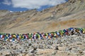 Colorful buddhist flags and lot of stone pyramids Royalty Free Stock Photo