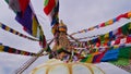 Colorful Buddhist prayer flags on top of famous Boudhanath stupa (Boudha) in the center of Kathmandu, Nepal. Royalty Free Stock Photo