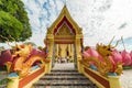 Colorful Buddhist Temple entrance with dragons, lotus flower and