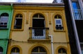 A colorful building in the downtown of Fort de France, Martinique. Colorful house, windows with wooden shutters Royalty Free Stock Photo