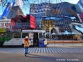 The colorful building and tram in front of RMIT University in Melbourne