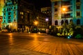 Colorful buildings along the boardwalk at night in Atlantic City