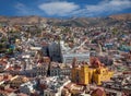 Colorful Buildings and Cathedral in City of Guanajuato from Mexico Against Cloudy Blue Sky Royalty Free Stock Photo