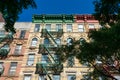 Colorful Buildings with Fire Escapes in Manhattan within New York City Royalty Free Stock Photo