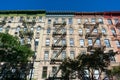 Colorful Buildings with Fire Escapes in Manhattan within New York City Royalty Free Stock Photo