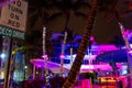 Colorful buildings and palm trees in Miami Beach at night Royalty Free Stock Photo