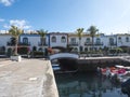 Colorful buildings of Puerto de Mogan with sea canals and boats. Traditional spanish colonial architecture of small