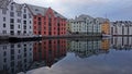 colorful buildings reflects in the sea water, Norwegian Fjords, Alesund, Norway Royalty Free Stock Photo