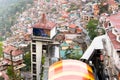 Buildings on a mountainside of shimla at dusk