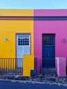 Colorful buildings in yellow and pink colors in Bo-Kaap, Cape Town