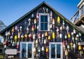 Colorful buoys hanging outside a small shop in Maine