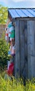 Colorful buoys on lobster house Maine coast