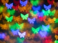 Colorful butterfly bokeh at night for background. Royalty Free Stock Photo