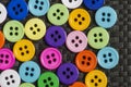 Colorful buttons background. Clothing sewing in tailor shop