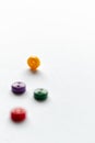 Colorful buttons on white background, red, yellow green blue or violet button, tiny little buttons closeup Royalty Free Stock Photo