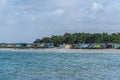 Colorful cabins at the beach in Skanor in Sweden