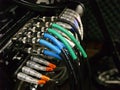Colorful Cables Plugged into a Sound Board Royalty Free Stock Photo