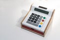 Colorful calculator with side wood and red drawer Royalty Free Stock Photo