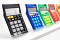 Colorful calculators on showcase in stationery store Royalty Free Stock Photo