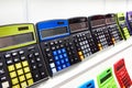 Colorful calculators on showcase in stationery store Royalty Free Stock Photo