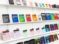 Colorful calculators on showcase in stationery store Royalty Free Stock Photo