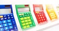Colorful calculators in stationery store Royalty Free Stock Photo