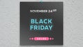 A black beautiful banner with a colorful calendar date of Black Friday 2023 on it