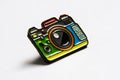 Colorful camera badge on a white paper
