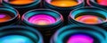Colorful camera lenses arranged in a visually striking pattern with vibrant reflections, copy space for text