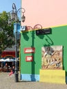 Colorful Caminito Street in La Boca district in Buenos Aires, Argentina. Street lamp and mural Royalty Free Stock Photo