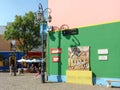 Colorful Caminito Street in La Boca district in Buenos Aires, Argentina. Street lamp and mural Royalty Free Stock Photo