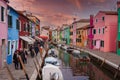 Colorful Canal in Burano, Italy with Boats and Reflections - Venetian Architecture Collection Royalty Free Stock Photo