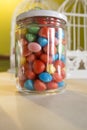 Colorful candied sweets displayed in glass jar Royalty Free Stock Photo