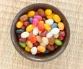 Colorful candies in brown bowl
