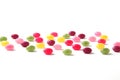 colorful candies jelly beans spread on white background Royalty Free Stock Photo