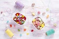 Colorful candies and jelly beans in two white ceramic bowls. Royalty Free Stock Photo
