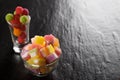 Colorful candies, jelly and marmalade and jellybeans around a ce Royalty Free Stock Photo