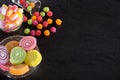 Colorful candies, jelly and marmalade and jellybeans around a ce Royalty Free Stock Photo