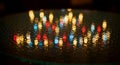 Colorful Candle Reflections on Wet Surface Abstract Scene Royalty Free Stock Photo
