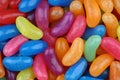 Colorful candy beans as texture and background for design. Close up view of jelly candy beans with selective focus Royalty Free Stock Photo