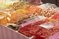colorful candy, jelly sweets in plastic container on showcase in sweet-shop