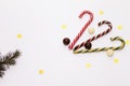 Colorful candy lollipops, chocolate on white background, fir branch, new year, Christmas Royalty Free Stock Photo