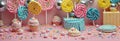Colorful candy wonderland with lollipops and cupcakes on pink background Royalty Free Stock Photo