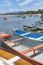 Colorful canoe boats parked on the body of the lake