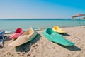 Colorful Canoes on Beach